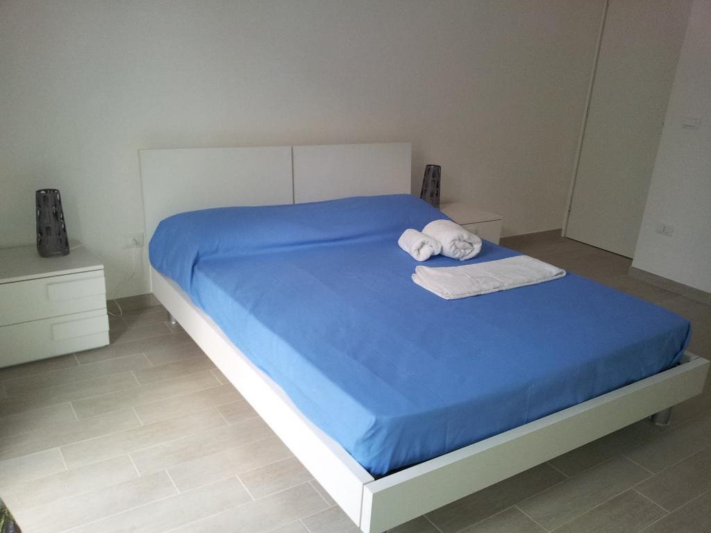 Апартаменты Casa Vacanza Comfort Челье-Мессапика Номер фото